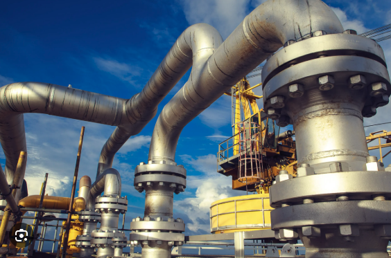 Steel pipe flange connection with stud bolts and heavy hex nuts installed in refinery process unit