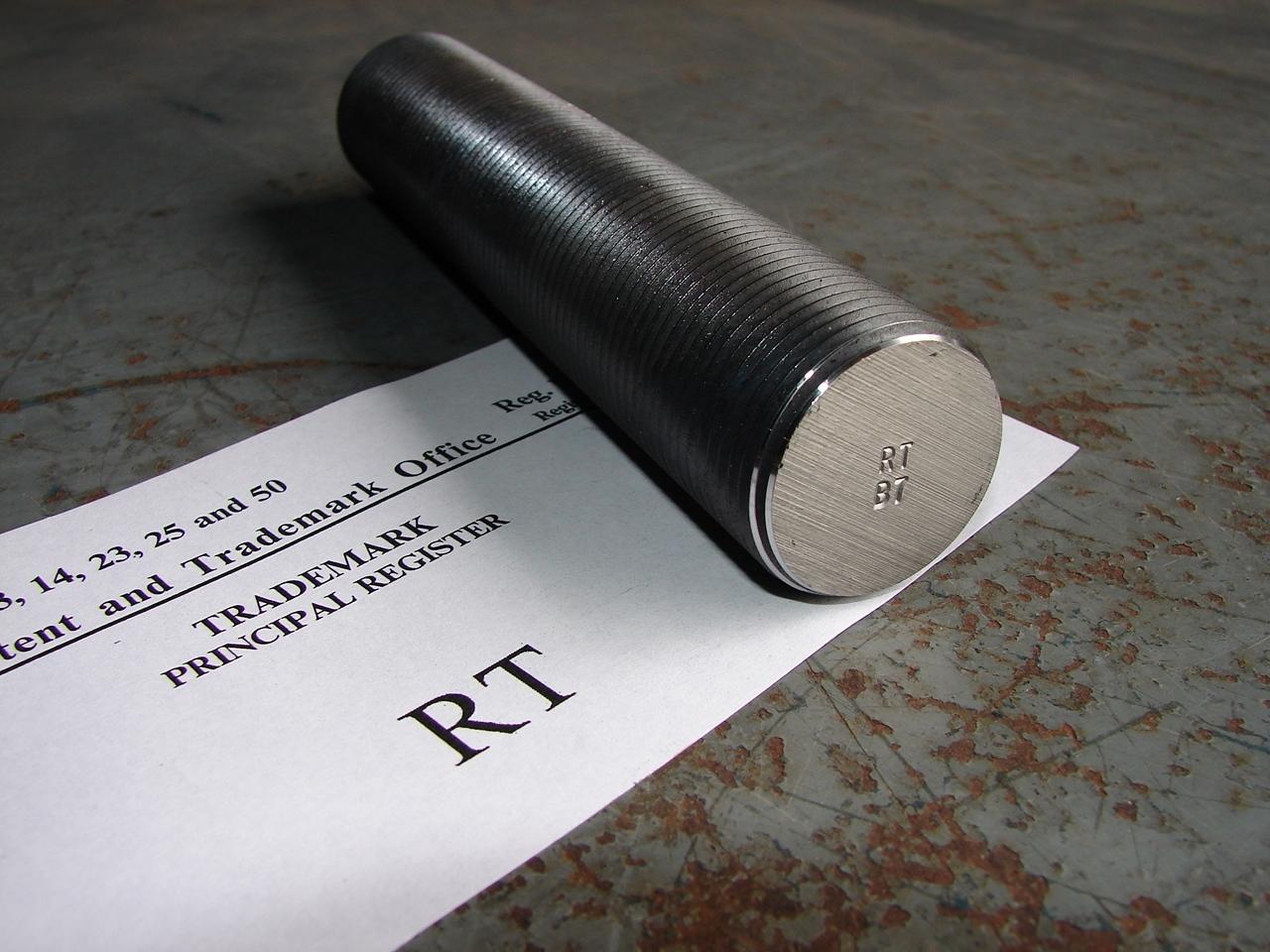 Stud bolt marked with RT™ trademark with official documentation showing RAM Threading certification